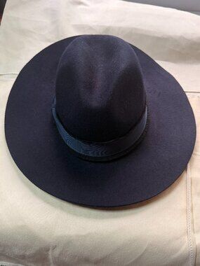 black wide-brim hat